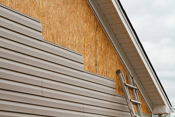Professional Siding Installation technician working in Concord, NC